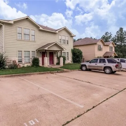Rent this 3 bed house on 123 Sendero Drive in Huntsville, TX 77340