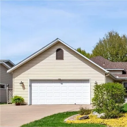 Buy this 4 bed house on 7584 18th Street North in Oakdale, MN 55128