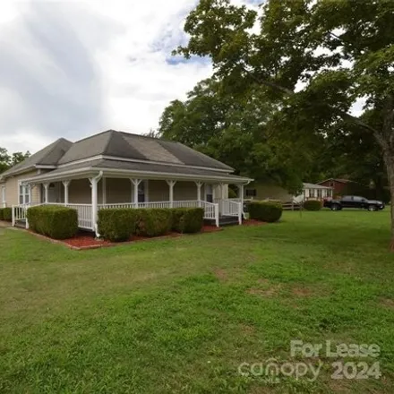 Rent this 3 bed house on 107 Maxwell Ave in Huntersville, North Carolina