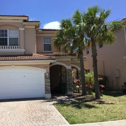 Buy this 4 bed house on 907 Northwest Leonard Circle in Port Saint Lucie, FL 34986