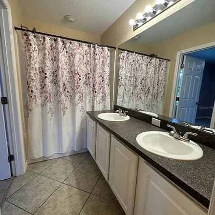 Rent this 4 bed apartment on 12394 Northeast 50th View in Wildwood, FL 32162