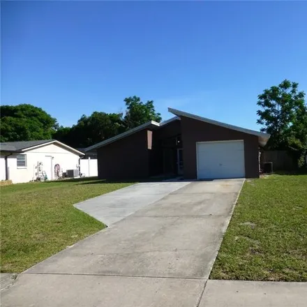 Rent this 2 bed house on 5657 Dahlia Avenue in Elfers, FL 34652