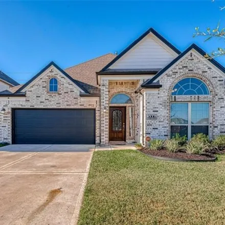 Rent this 4 bed house on Lacebark Pine Trail in Fort Bend County, TX 77471