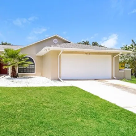 Image 1 - 1378 Tilberg Avenue Northwest, Palm Bay, FL 32907, USA - House for rent