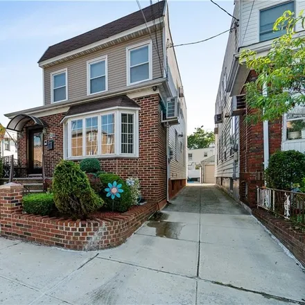 Buy this 6 bed townhouse on 1464 84th Street in New York, NY 11228