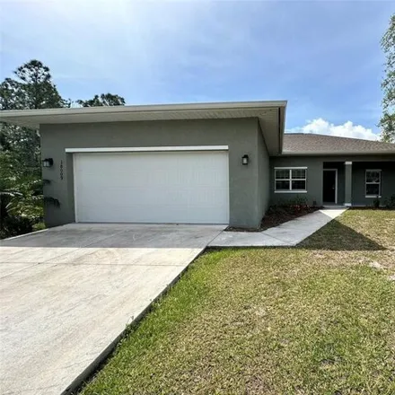 Rent this 3 bed house on 18006 Poston Avenue in Port Charlotte, FL 33948