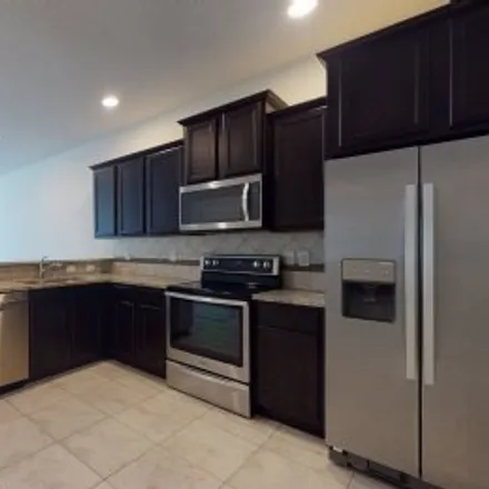 Rent this 2 bed apartment on 4710 White Sanderling Court in Greater Palm River Point, Tampa
