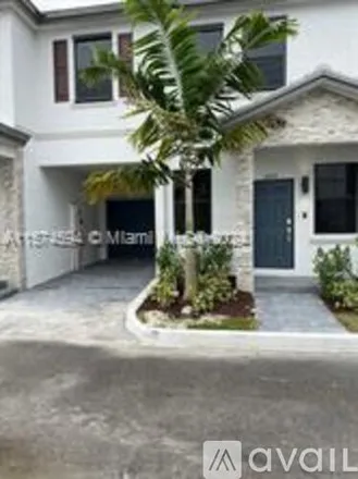 Rent this 3 bed townhouse on 2831 SW 16th Terrace