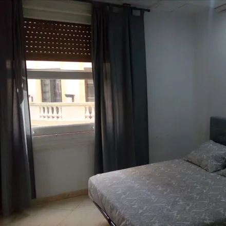 Rent this 7 bed room on Cafeteria Suizo in Carrer de la Barcelonina, 46002 Valencia