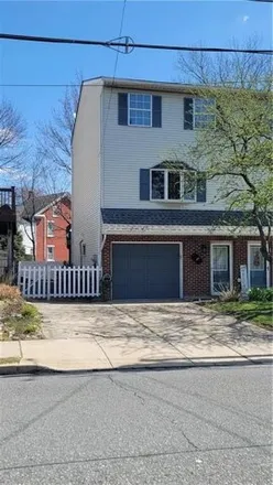 Rent this 3 bed townhouse on Union Beverage in 906 Club Avenue, Allentown