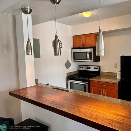 Rent this 1 bed apartment on 3234 Northeast 12th Street in Country Club Isles, Pompano Beach