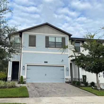 Rent this 4 bed house on 11022 Whistling Pine Way in Orange County, FL 32832