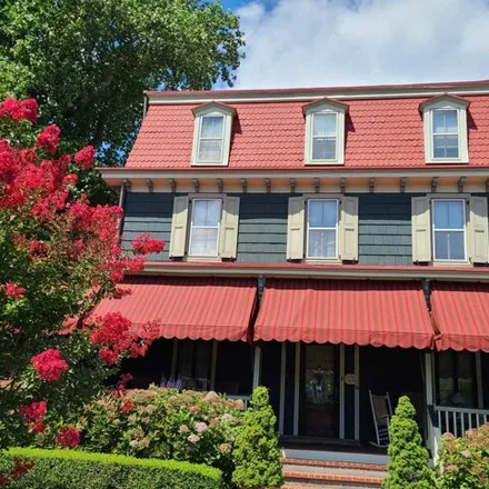 Buy this 9 bed house on The Thomas Webster House Victorian Suites in Madison Avenue, Cape May