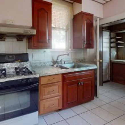 Buy this 4 bed apartment on 430 West Grange Avenue in Upper North District, Philadelphia