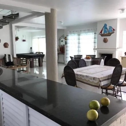 Rent this 7 bed house on Rua Hercelina Maria Vieira in Balneário Camboriú - SC, 88334-020