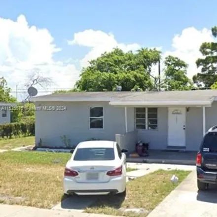 Buy this 5 bed house on 1213 Northwest 19th Avenue in Fort Lauderdale, FL 33311
