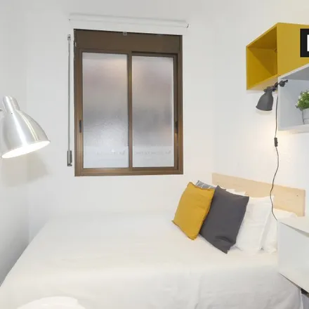 Rent this 4 bed room on Carrer Gran de Gràcia in 08001 Barcelona, Spain