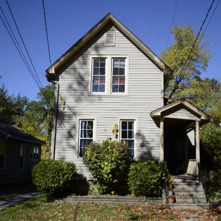 Rent this 3 bed house on 756 W. Washington Ave.