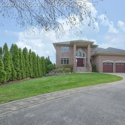 Buy this 5 bed house on unnamed road in Commerce Charter Township, MI 48382