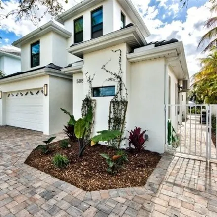 Rent this 5 bed house on Hodges Funeral Home in 525 111th Avenue North, Naples