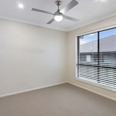 Rent this 4 bed apartment on 11 Sunset Drive in Glenvale QLD 4350, Australia