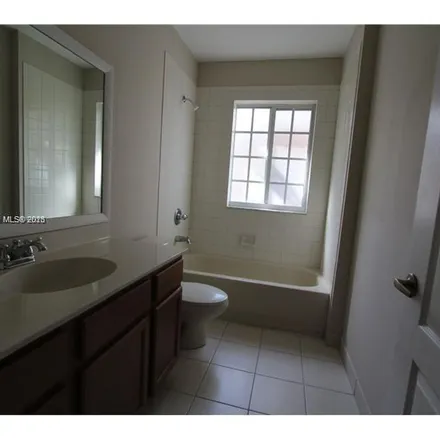 Rent this 3 bed apartment on 21215 Northwest 14th Place in Miami Gardens, FL 33169