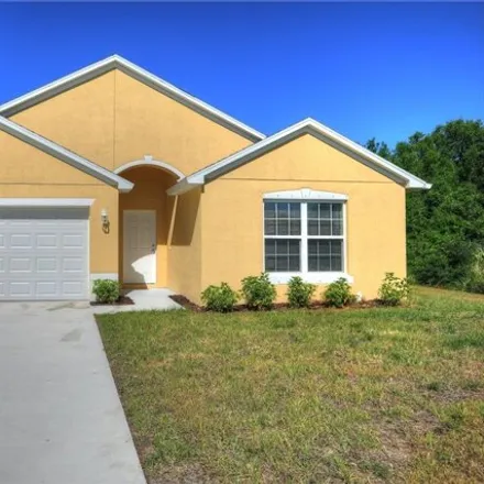 Rent this 4 bed house on 8215 104th Avenue in Vero Lake Estates, Indian River County