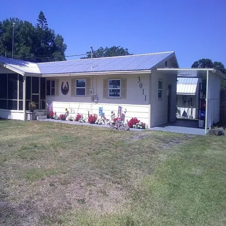 Buy this 2 bed house on 2968 Southeast 33rd Drive in Taylor Creek, Okeechobee County