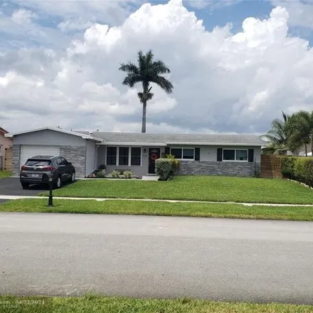 Buy this 4 bed house on 9525 Northwest 5th Street in Pembroke Pines, FL 33024