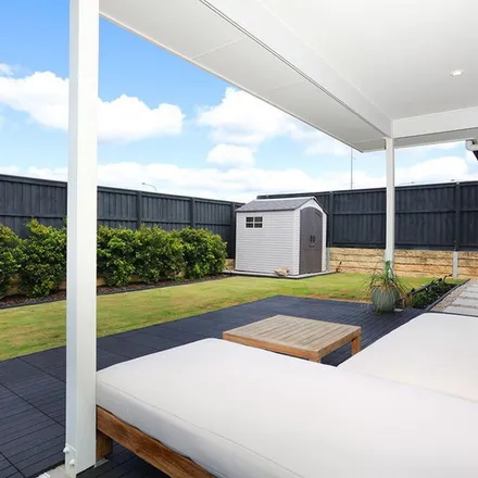 Rent this 4 bed apartment on Pimpama State Primary College in Cotman Way, Pimpama QLD 4209