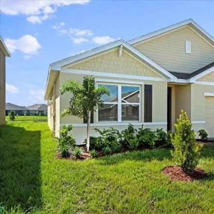 Rent this 4 bed house on 915 Dugan Cir SE in Palm Bay, Florida