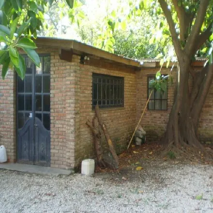Buy this 4 bed townhouse on Guido y Spano in Partido de San Miguel, B1661 INW Bella Vista