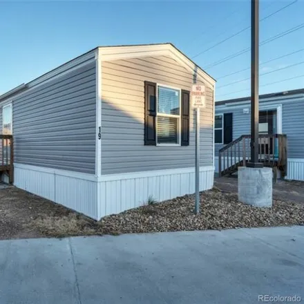 Buy this studio apartment on 6900 Old State Highway 2 in Adams City, Commerce City