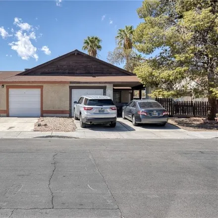 Rent this 3 bed townhouse on 4714 Woodlake Avenue in Spring Valley, NV 89147