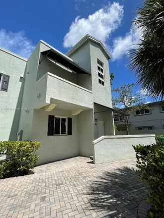 Rent this 3 bed townhouse on 5838 Devonshire Boulevard in Miami-Dade County, FL 33155