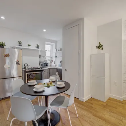 Rent this 5 bed apartment on 61-47 Woodbine Street in New York, NY 11385