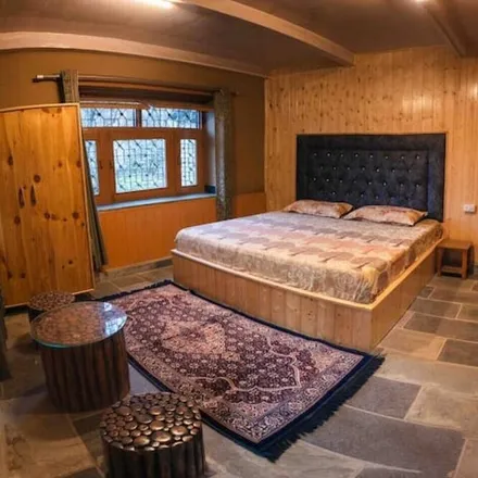 Rent this 4 bed townhouse on Kullu District in Manali - 175131, Himachal Pradesh