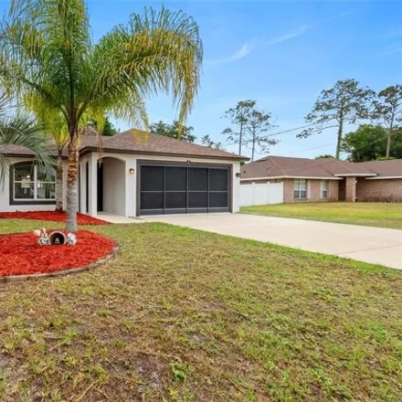 Buy this 3 bed house on 33 Zephyr Lily Place in Palm Coast, FL 32164