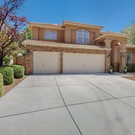 Buy this 4 bed house on 12078 Caribou Avenue Northeast in Antelope Run, Albuquerque