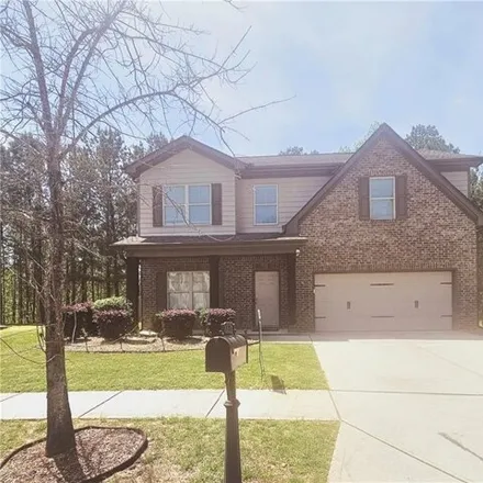 Rent this 4 bed house on 243 Roland Manor Drive in Gwinnett County, GA 30019