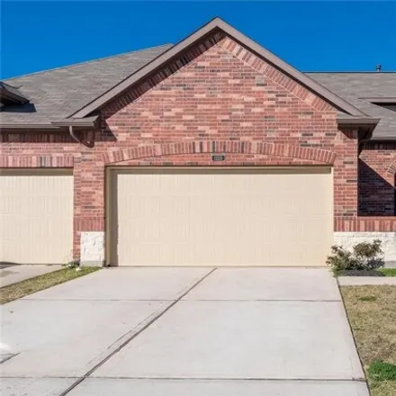 Rent this 3 bed house on 12225 Ghita Lane in Harris County, TX 77044