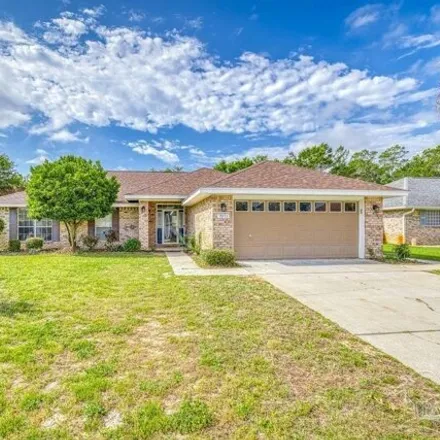 Buy this 4 bed house on 7071 Brighton Oaks Blvd in Navarre, Florida