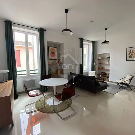 Rent this 2 bed apartment on 1 Place des Arènes in 30000 Nîmes, France