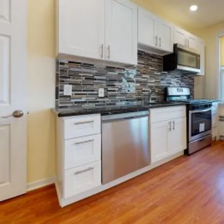 Buy this 3 bed apartment on 7529 Woolston Avenue in Upper North District, Philadelphia