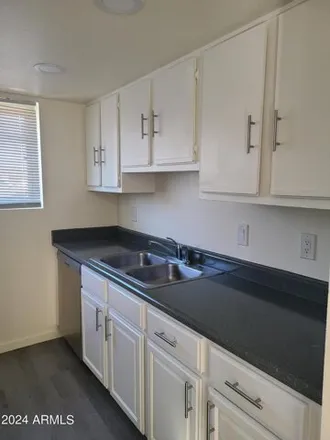 Rent this 2 bed apartment on 11317 West 113th Lane in Youngtown, Maricopa County