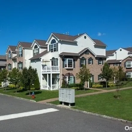 Rent this 2 bed townhouse on 7 Village Plaza Drive in Lake Ronkonkoma, Suffolk County