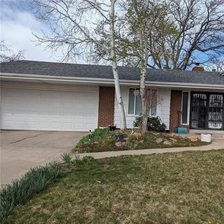 Buy this 4 bed house on 7067 Carr Street in Arvada, CO 80004