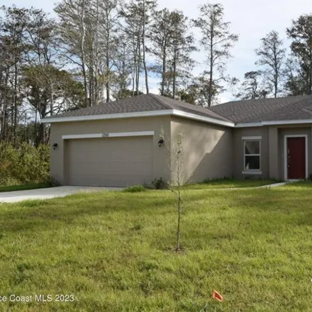 Rent this 3 bed house on 1348 Sagbloom Street Southeast in Palm Bay, FL 32909