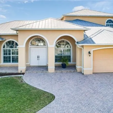 Buy this 4 bed house on Southeast 20th Place in Cape Coral, FL
