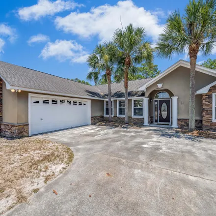 Buy this 3 bed house on 138 Grand Lagoon Shores Drive in Panama City Beach, FL 32408